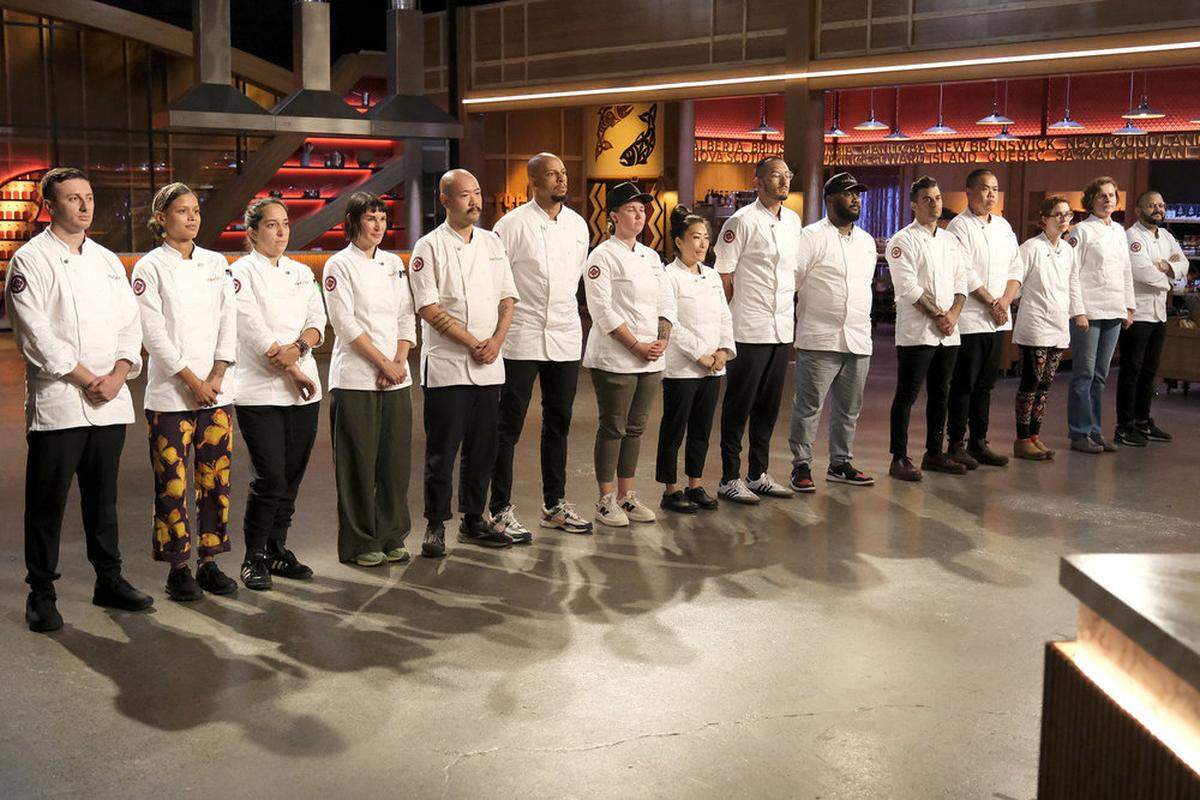 Contestants on Bravo’s “Top Chef” for Season 22 assemble for the first episode, “Across Canada, We Go!” From left, Vincenzo Loseto, Lana Lagomarsini, Paula Endara, Kat Turner, Henry Lu, Corwin Hemming, Mimi Weissenborn, Katianna Hong, Cesar Murilo, Massimo Piedimonte, Shuai Wong, Bailey Sullivan, Anya El-Wattar and Zubair Mohajirl.