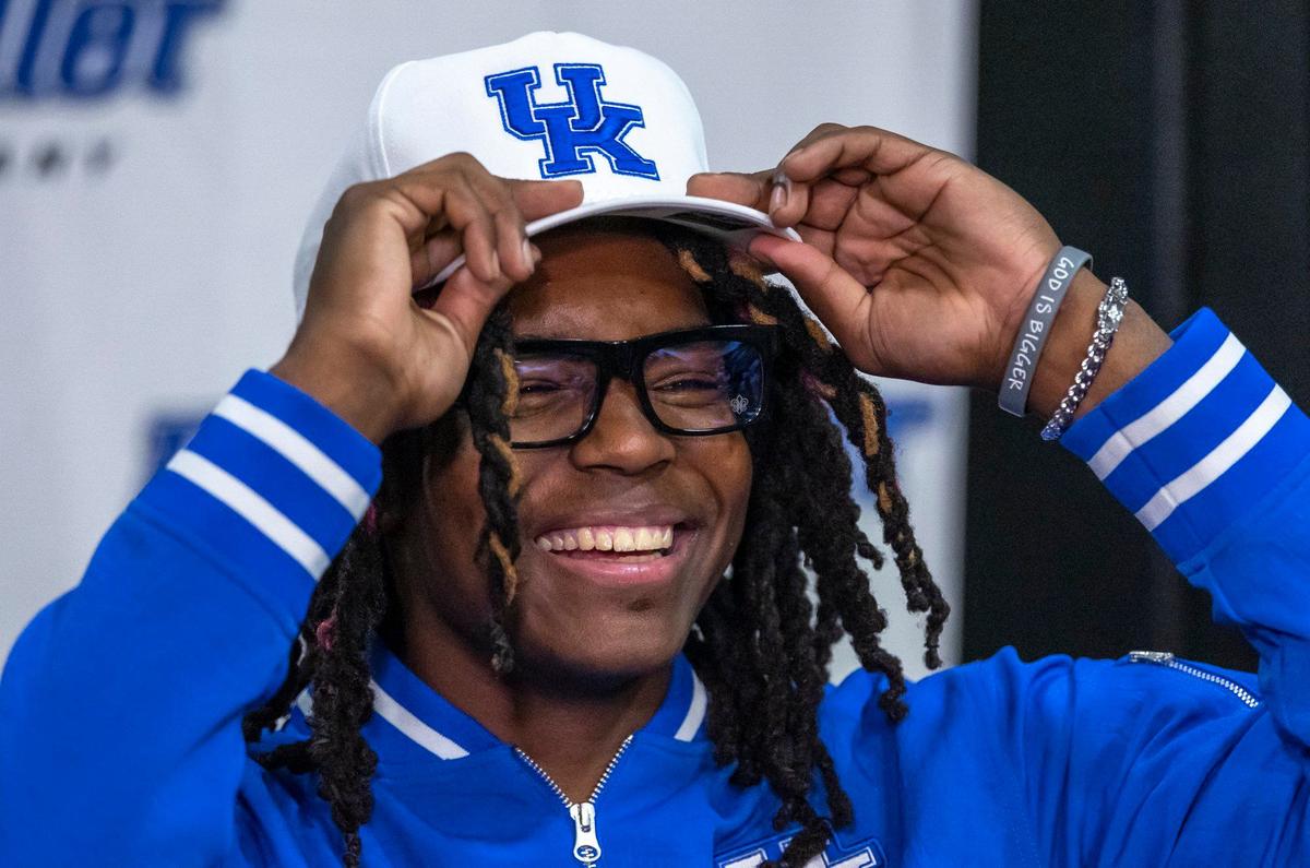 Jasper Johnson, a class of 2025 college basketball recruit and a former Woodford County star basketball player, committed to the University of Kentucky during a ceremony at Woodford County High School in Versailles, Ky., on Thursday, Sept. 5, 2024.