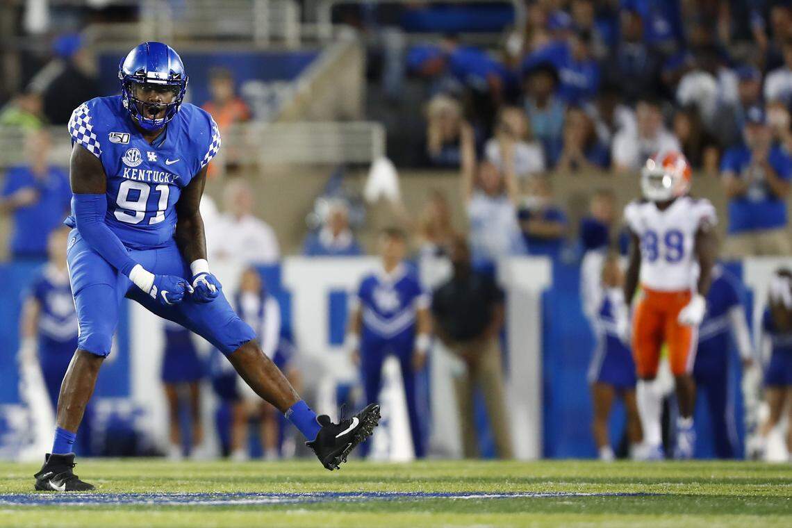 Kentucky defensive end Calvin Taylor (91) celebrated early in UK’s game with Florida this season. The Gators rallied late for a 29-21 win over the Wildcats.