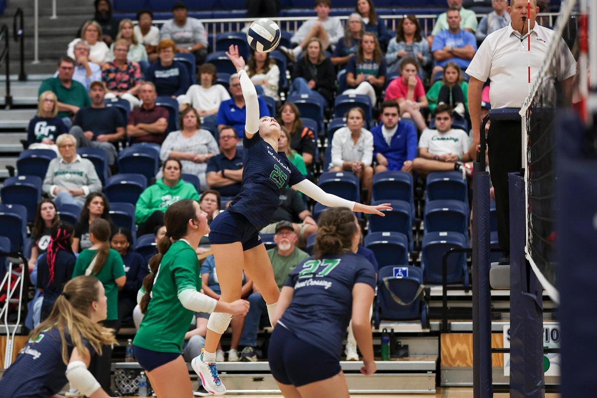 Libby Erwin (25) spikes a winner for Great Crossing during their match against Dunbar on Wednesday night. The fifth-ranked Warhawks (20-1) were defeated for the first time this season.