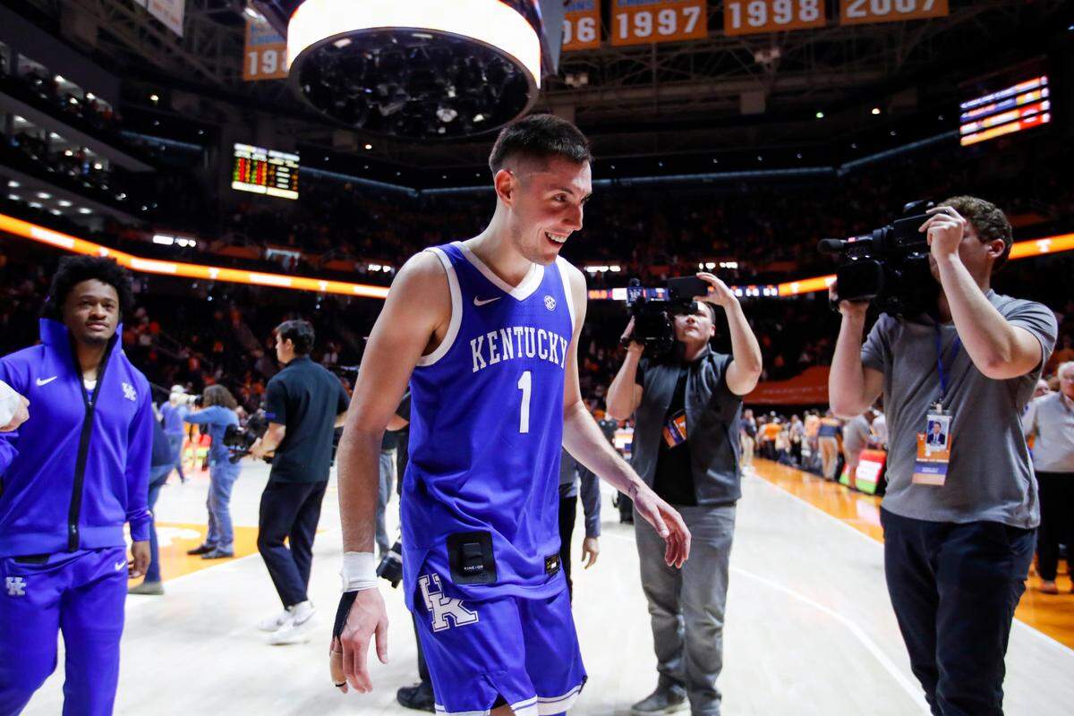 Kentucky guard CJ Fredrick celebrates while walking off the court at Thompson-Boling Arena after UK defeated No. 5 Tennessee on Saturday.