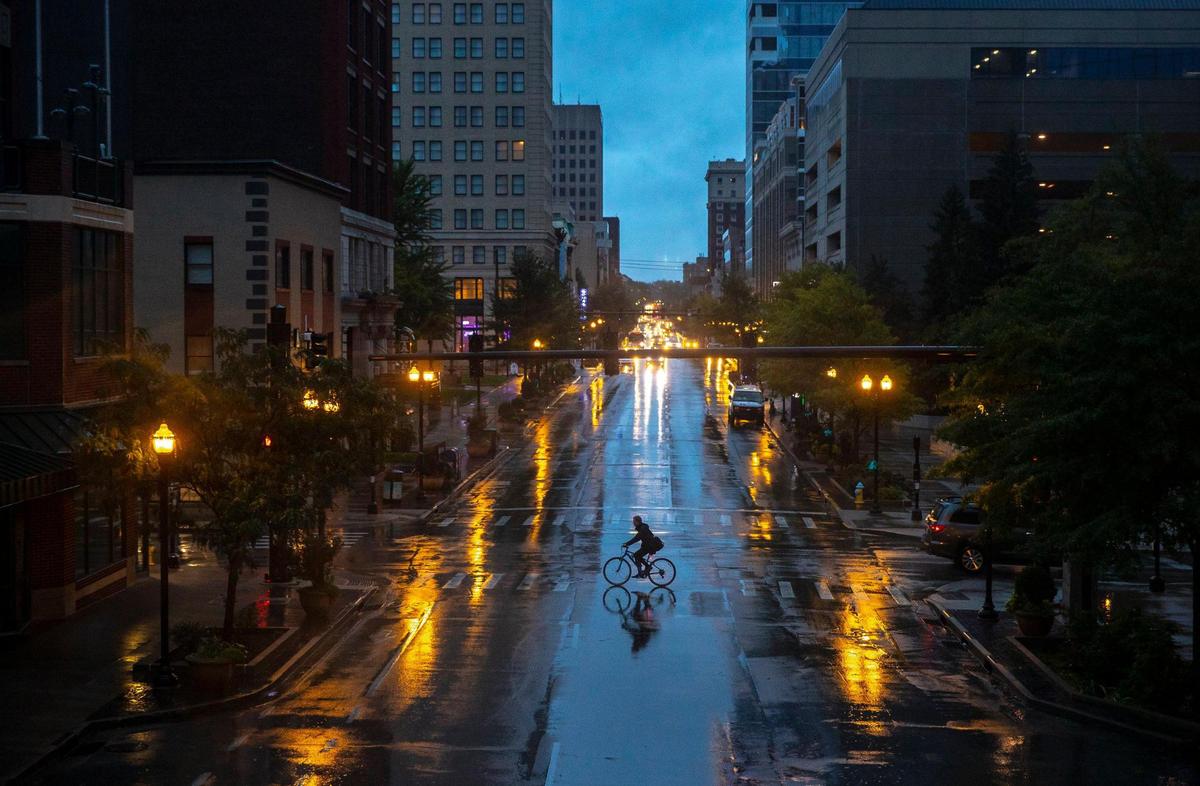 A cyclist crosses West Main Street in downtown Lexington on Wednesday, Sept. 22, 2021, the first day of autumn.