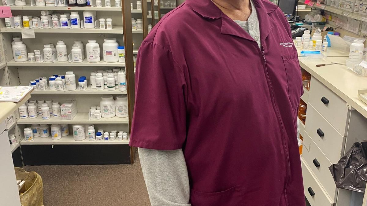 Richard Slone stands behind the counter at one of three independent pharmacies he owns and operates in Eastern Kentucky: RX Discount Pharmacy in Hazard. Crippling fees have led Slone to pull from his personal retirement and savings to keep his stores afloat.