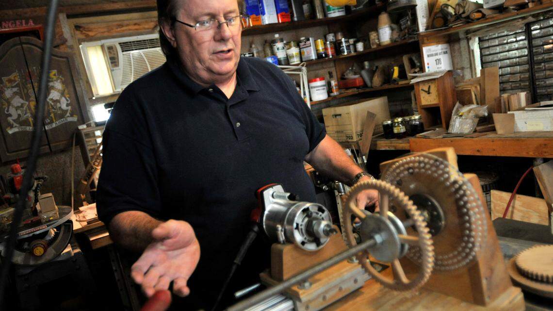 An engineer by training, woodworker Keith Chambers designed the device in his workshop that he uses to carve out the wooden gears for his handmade clocks. 