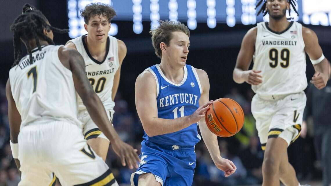 ‘I was devastated,’ Mark Pope says of Travis Perry’s decision to transfer