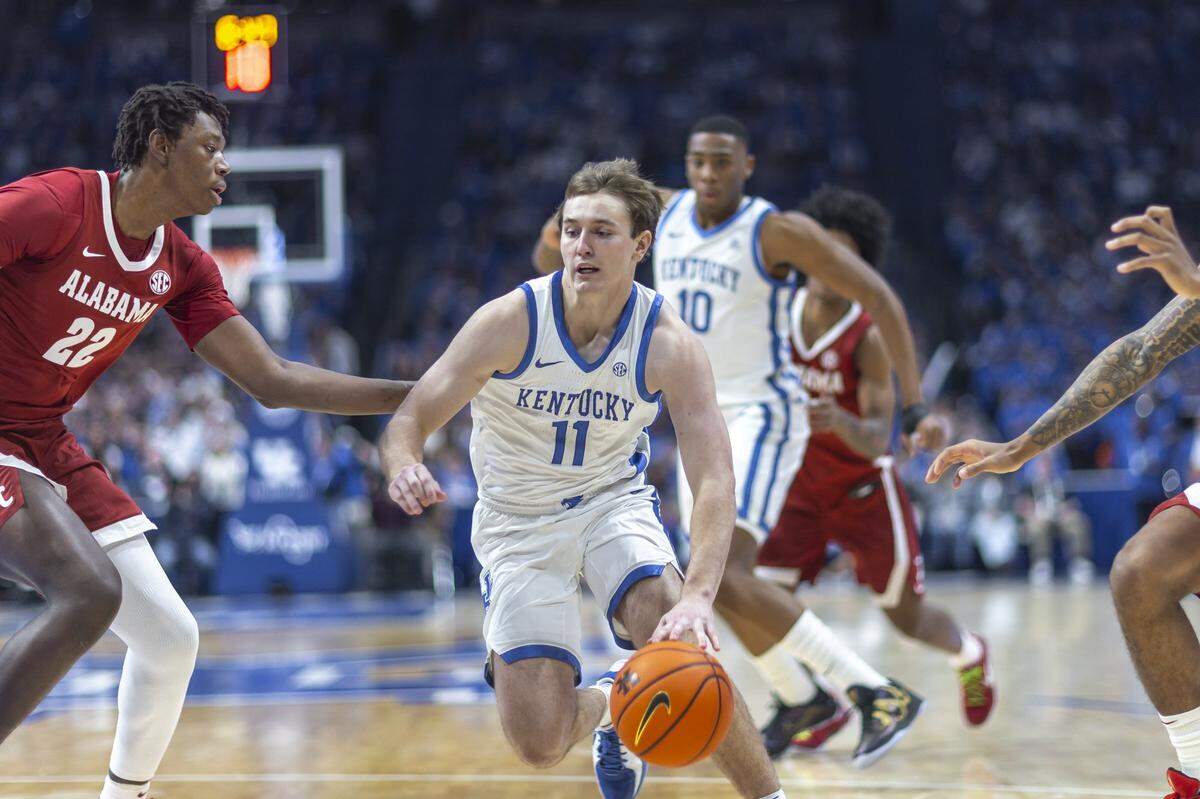 Travis Perry averaged 2.7 points in 9.8 minutes per game over 31 appearances for Kentucky last season.