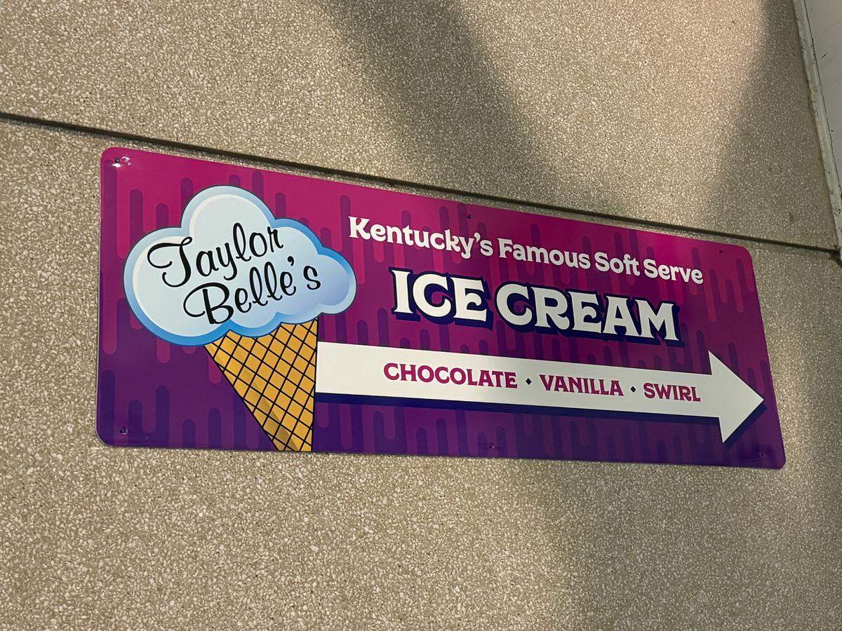 A sign directing fans to a Taylor Belle’s concession stand at Kroger Field is shown during UK football’s 2024 season-opening game against Southern Miss on Saturday.