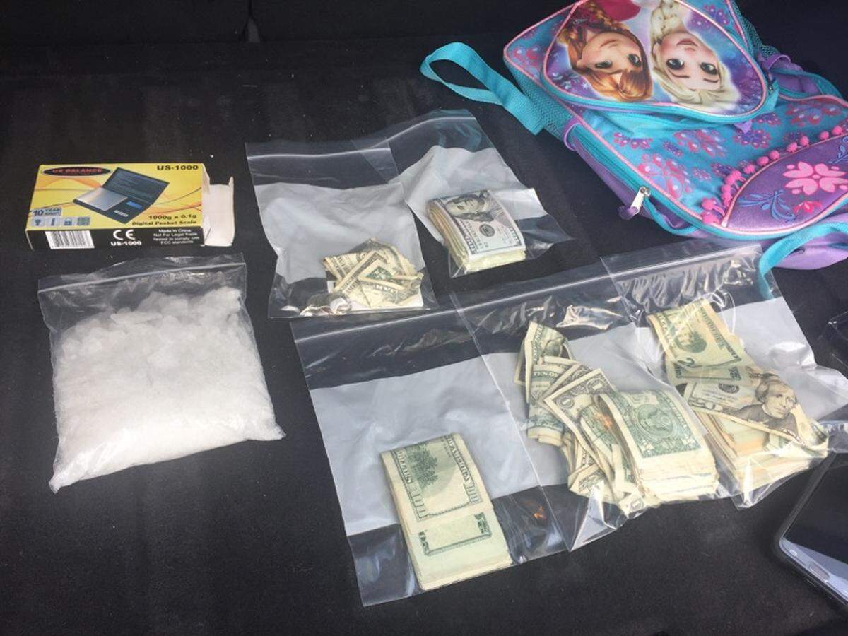 Crystal meth and cash seized in a drug investigation in Kentucky are visible in this photo. The state has seen an increase in availability of the drug.