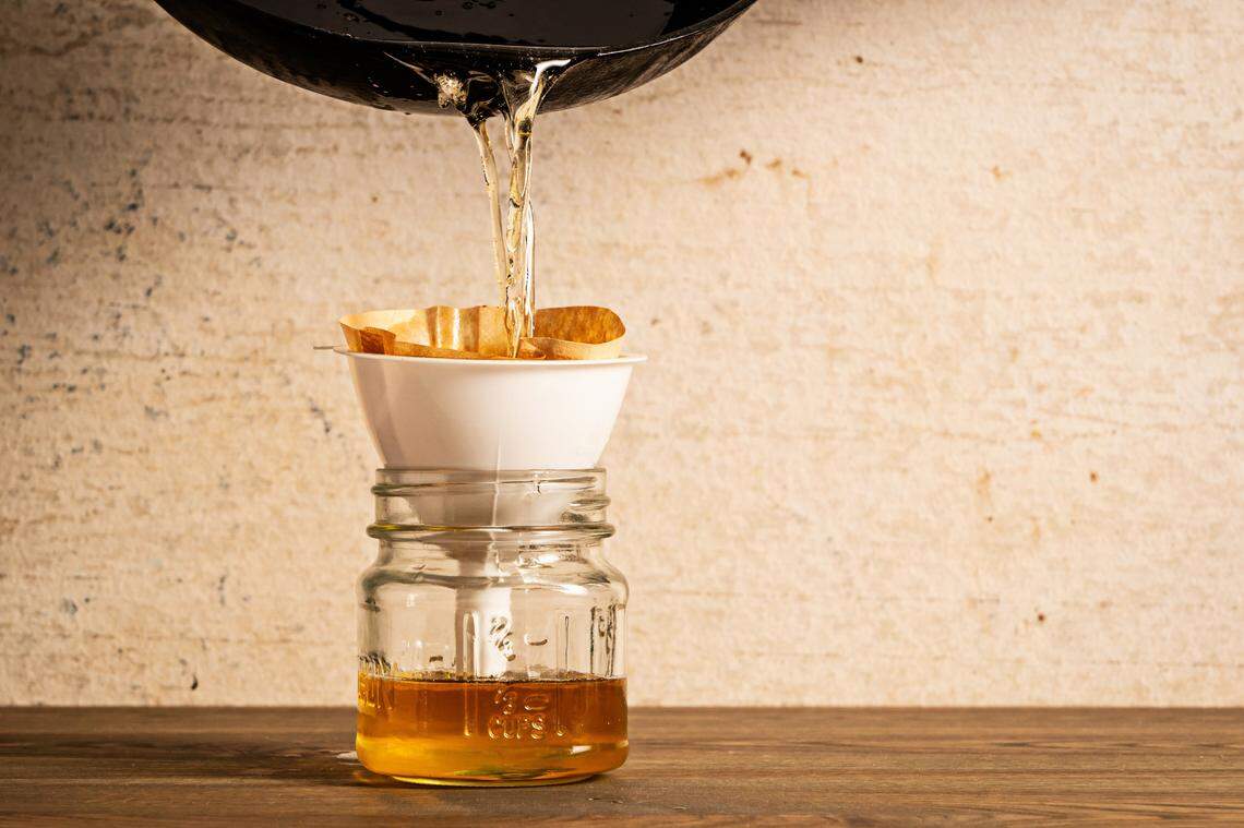 To store bacon fat, pour the still warm (but not hot!) liquid fat into a heatproof container through a fine mesh strainer or coffee filter and place it in the fridge or freezer.