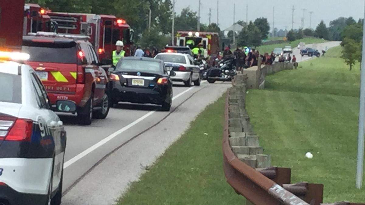 At least three people in a motorcycle caravan were injured Saturday afternoon on Newtown Pike.