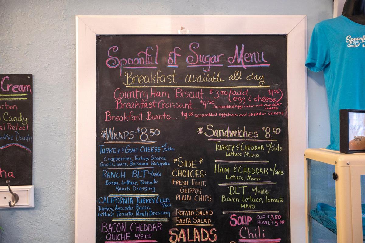 A menu board at Spoonful of Sugar, Sweets and Such. They first started off opening one day a week and are now five days and have since expanded the menu with lunch offerings.