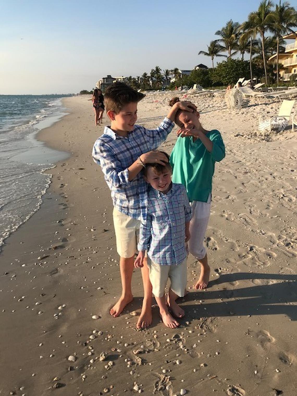 Buchart with his younger sister, Clay, and younger brother, Beau, on a family trip to Naples, Fla. in 2018.