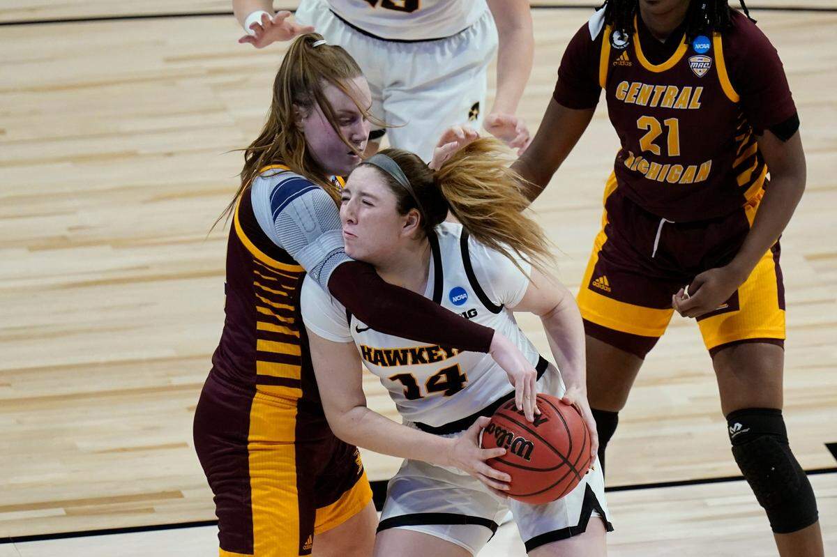 Iowa’s McKenna Warnock (14) has had points/rebounds double-doubles in three straight games.