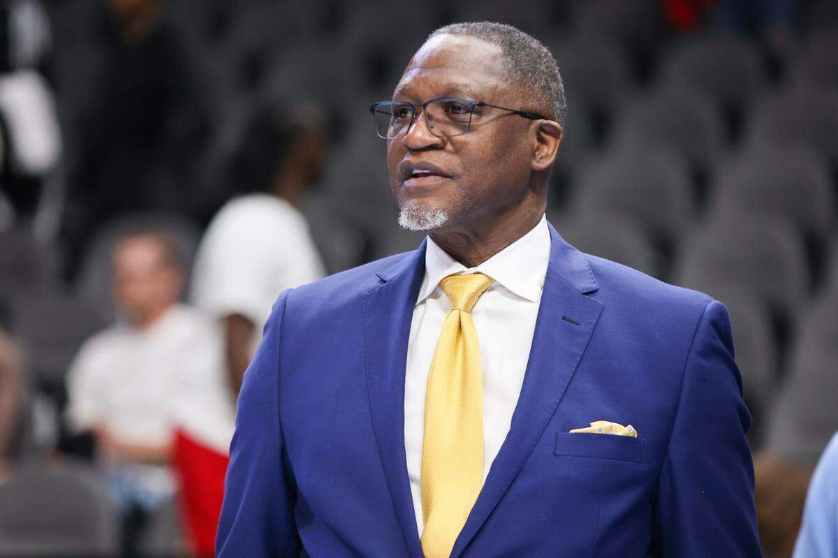 Mar 30, 2024; Atlanta, Georgia, USA; Former Atlanta Hawks forward Dominique Wilkins on the court before a game against the Milwaukee Bucks at State Farm Arena. Mandatory Credit: Brett Davis-USA TODAY Sports
