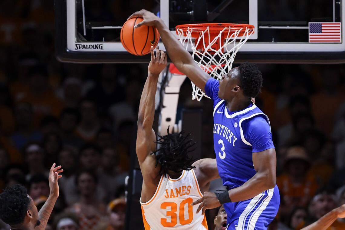 Kentucky’s Adou Thiero (3) stops a shot by Tennessee’s Josiah-Jordan James on Saturday in Knoxville.