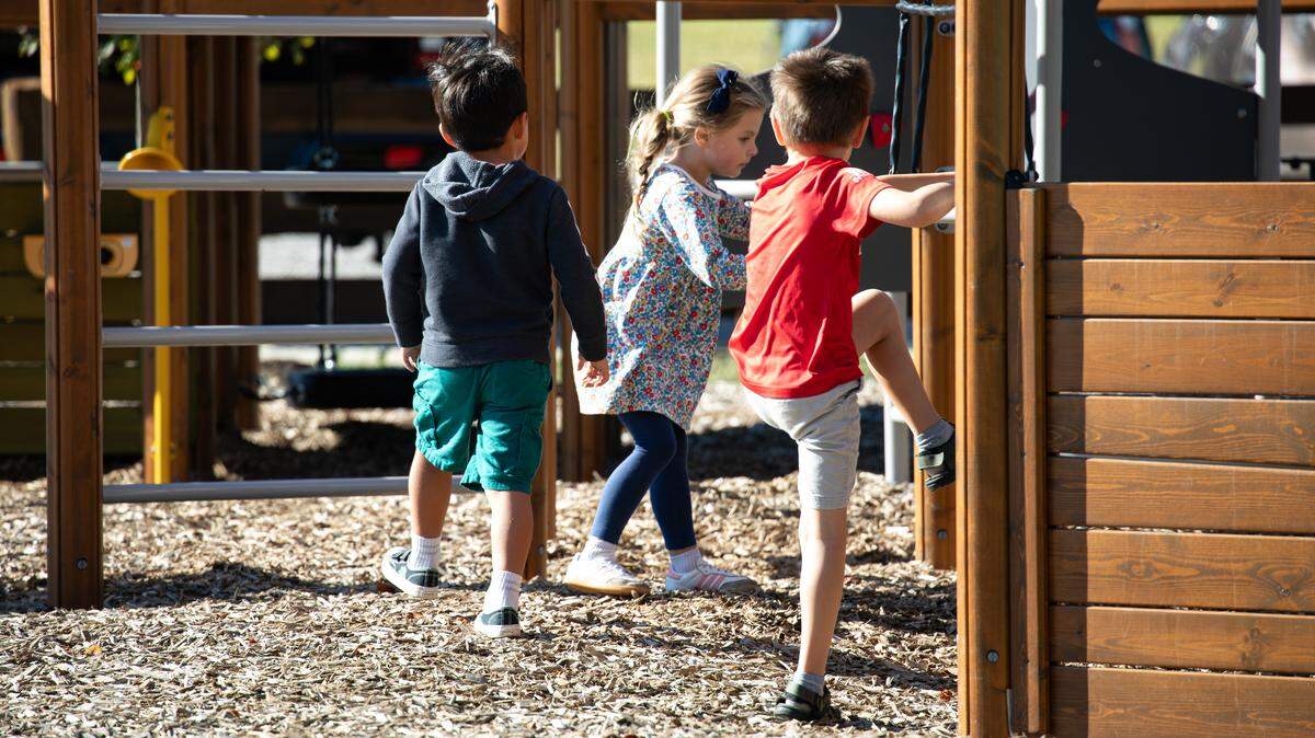 Children are enjoying the park's large playground following the ribbon-cutting ceremony officially opening Cardinal Run Park North on Oct. 9, 2025, in Lexington, Ky.