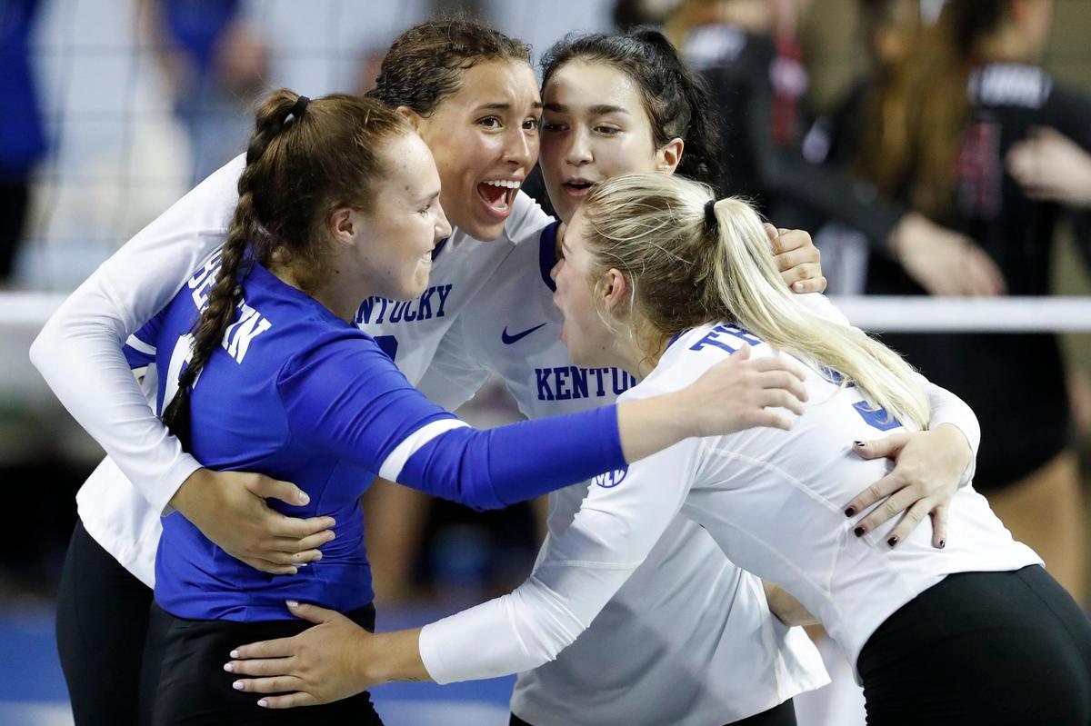 Kentucky’s Eleanor Beavin (6), Madi Skinner (2), Emma Grome (4) and Lauren Tharp (5) celebrate during Sunday’s win over Stanford in Memorial Coliseum. The Wildcats finished non-conference play with a 7-3 record.