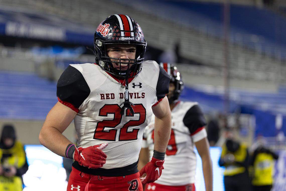 Owensboro's Evan Hampton (22) smiles after a touchdown during the Class 5A UK HealthCare Sports Medicine State Football Finals Saturday, December 6th, 2025 at Kroger Field in Lexington KY
