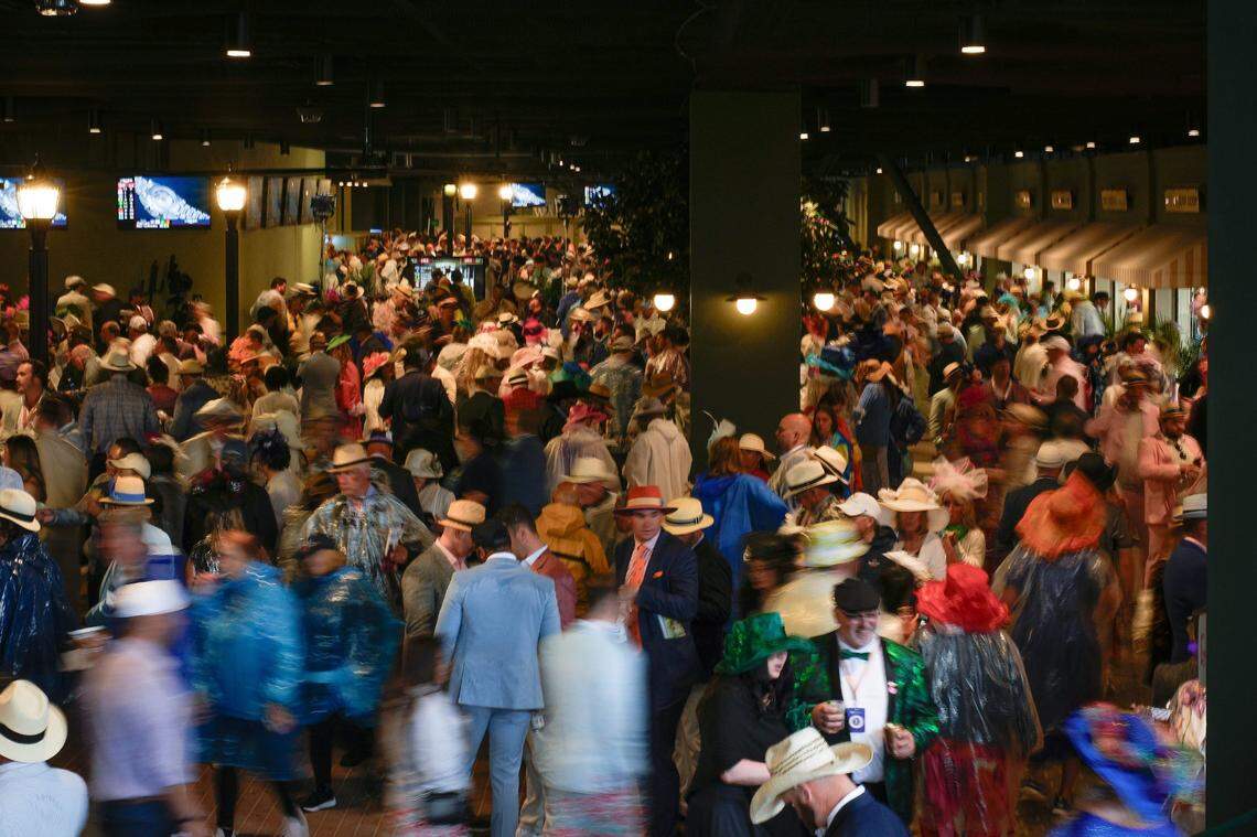 Attendees gather on the day of the 151th running of the Kentucky Derby at Churchill Downs.