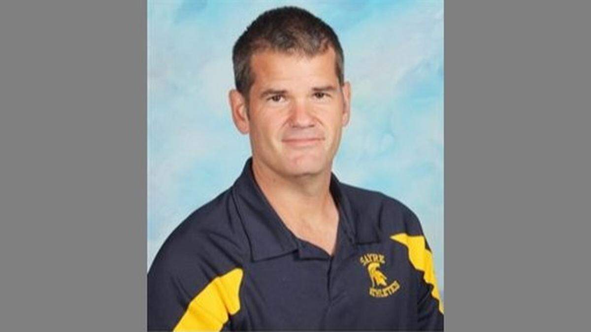 Former Sayre School athletic director Erik Johnson, right, died last week. He was 51.
