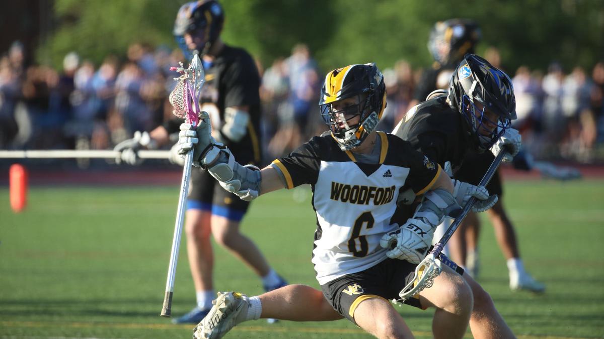 Woodford County’s Greyson Hodge takes possession during the Commonwealth Lacrosse League boys state championship game against Henry Clay. He scored five goals in his team’s victory.