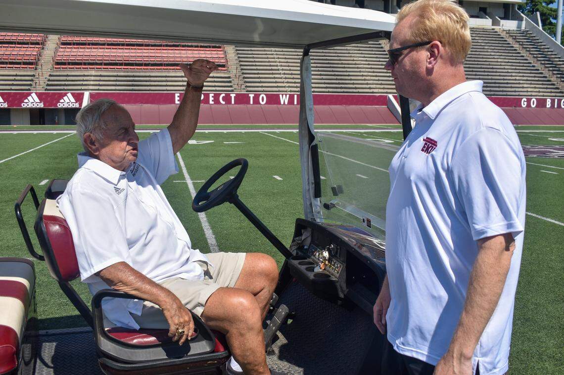Legendary former Eastern Kentucky football coach Roy Kidd talked with current Colonels head man Walt Wells while touring EKU football facility upgrades in 2021.