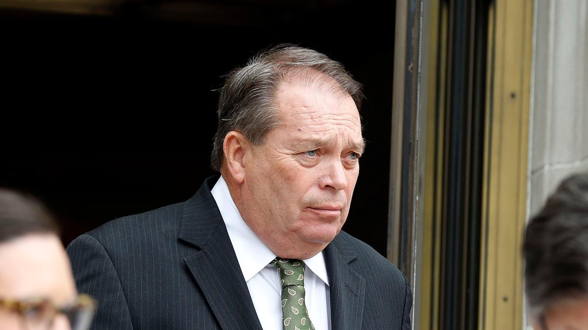 Jerry Lundergan left the federal courthouse on in Lexington after his first appearance on campaign finance charges in 2018.