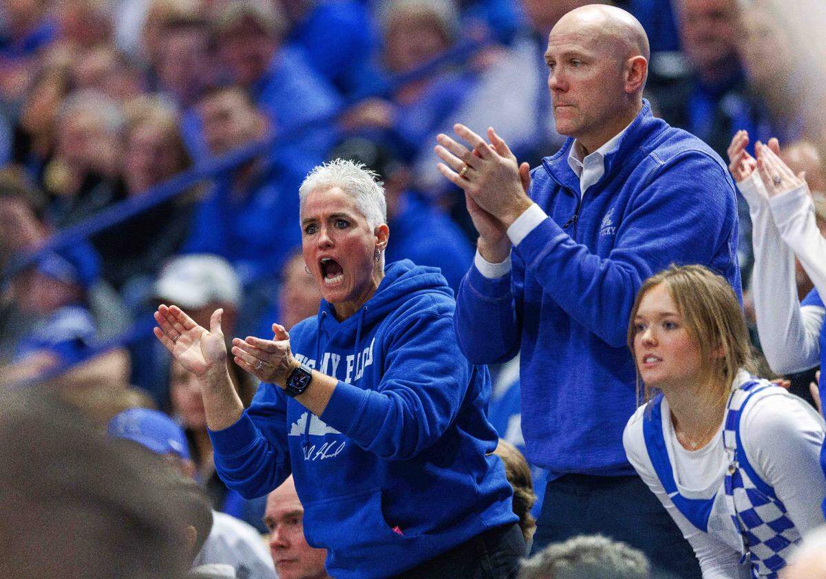 Jan 31, 2024; Lexington, Kentucky, USA; Parents of Kentucky Wildcats guard Reed Sheppard (15), Stacey and Jeff Sheppard, cheer during the first half against the Florida Gators at Rupp Arena at Central Bank Center. Mandatory Credit: Jordan Prather-USA TODAY Sports
