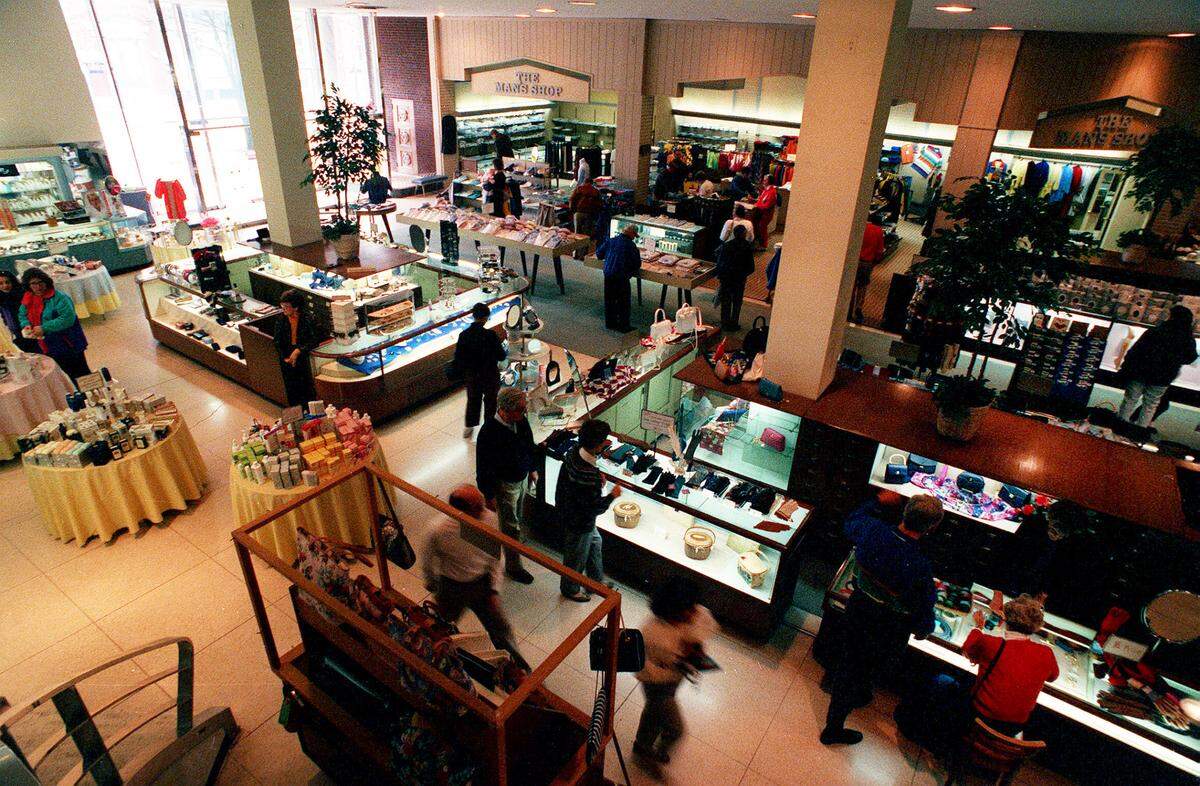 The aisles of Wolf Wile’s department store were filled April 7, 1992 with shoppers looking for going-out-of-business bargains. Sixteen days later on April 23, downtown Lexington’s last department store closed its doors after 103 years. Wolf Wile’s was known to generations of Lexingtonians for its sophisticated decor, personal service and lively window displays. Wolf Wile’s specialized in women’s apparel and accessories, but also sold men’s clothing, household goods and other merchandise. But the store became less of a force in Lexington retailing as suburban malls, round-the-clock mail order and bargain outlets became popular with time-pressed consumers. “I’ve traded with this store for 60 years,” said Virginia Williams of Morehead on one of the last days of the store. “I used to come here when I was a teenager. I hate to see it go. It really breaks my heart.” In the days leading up to the closing, shoppers said they would miss the quality of Wolf Wile’s merchandise, the exemplary service of the sales clerks and the excitement of the days when downtown hummed with retail activity. The store was at 244 E Main St. since 1950. Wolf Wile’s had been the only department store downtown since 1980, when Ben Snyder’s closed the store it had operated on East Main Street since 1935. Earlier downtown closings included Purcell’s in 1970, Stewart’s in 1979, Hymson’s in 1981, Embry’s in 1981 and Woolworth’s in 1990. Family owned, Wolf Wile’s attributed its survival to conservative management and low overhead – the company owned its East Main Street building. Today it is the offices for Gray Construction.