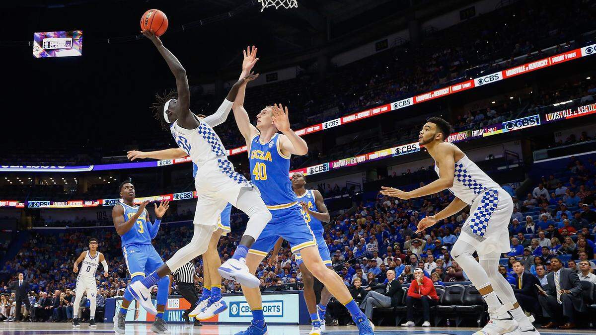 Wenyen Gabriel took a shot against Thomas Welsh in Kentucky's game against UCLA.