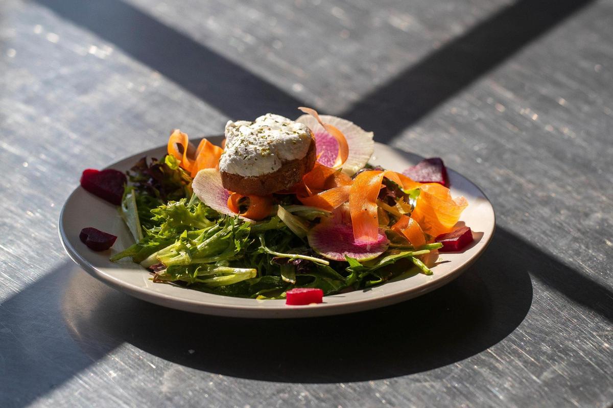 A green salad with honey mustard vinaigrette and goat cheese crouton Feb. 15, 2022 at the Lemon Tree.