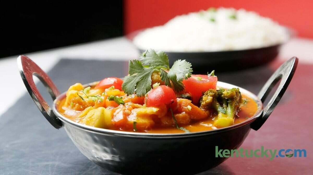 Vegetable patia with rice at Four Spice Indian Restaurant on Rojay Dr. in Lexington, Ky., on May 20, 2014.  Photo by Pablo Alcala | Staff