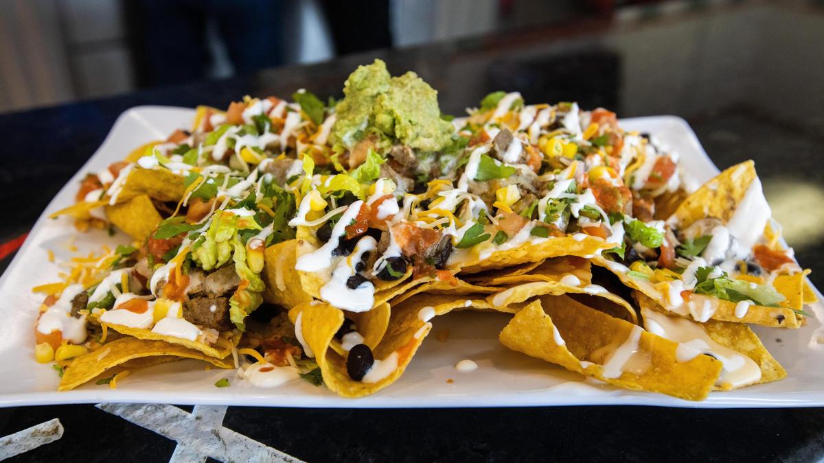 The super nachos from Pablo’s Fresh Mexican. Guacamole is available at no extra charge, unlike some popular chains.