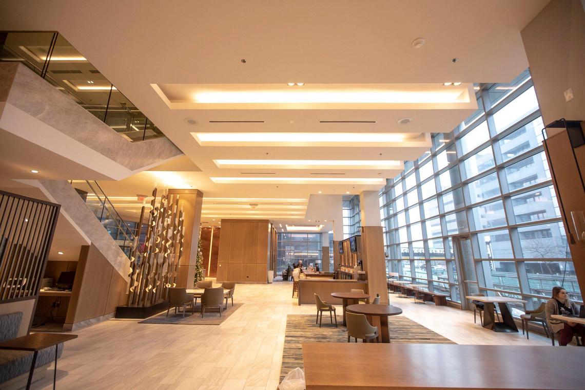 The Greatroom, which includes a bar and open kitchen, greets visitors at the new City Center Marriott.