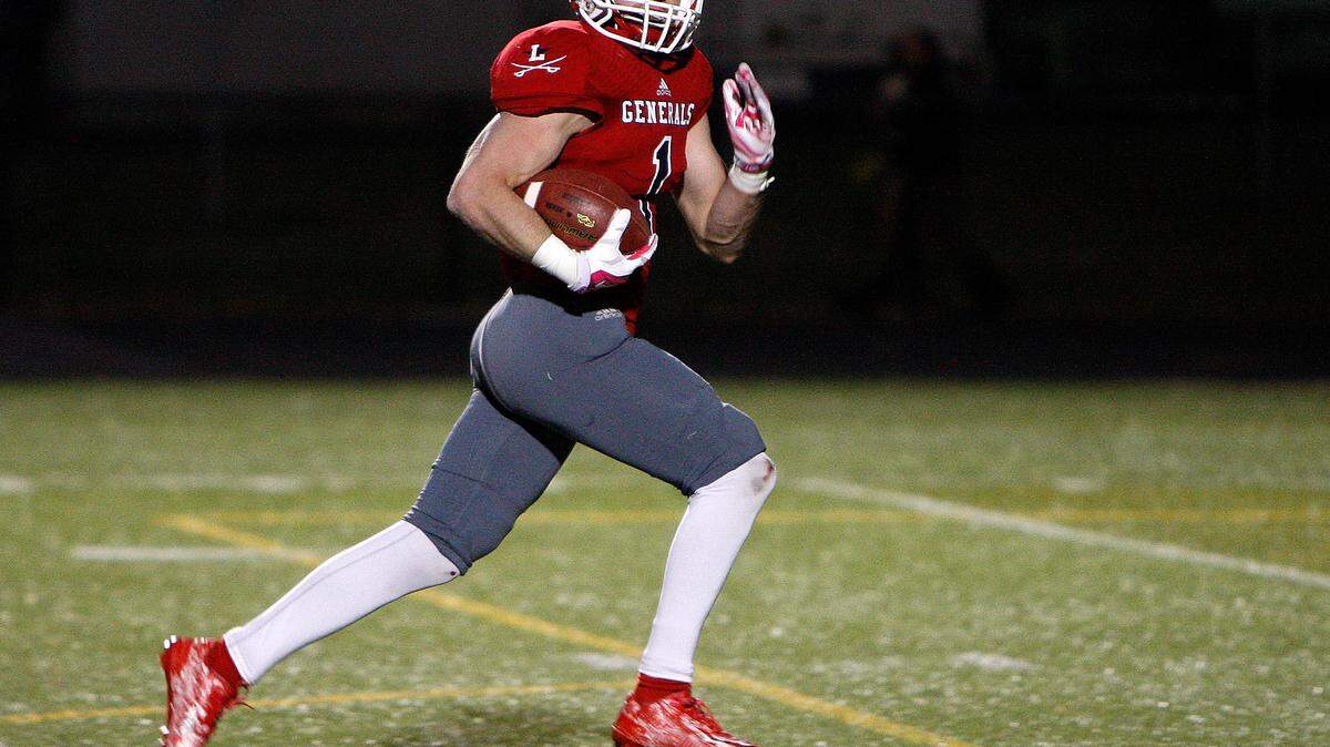 Lafayette's Mason Alstatt runs for an easy touchdown against Henry Clay during the playoff matchup at Ishmael Stadium in Lexington, Ky., Friday, November 13, 2015. Photo by Matt Goins