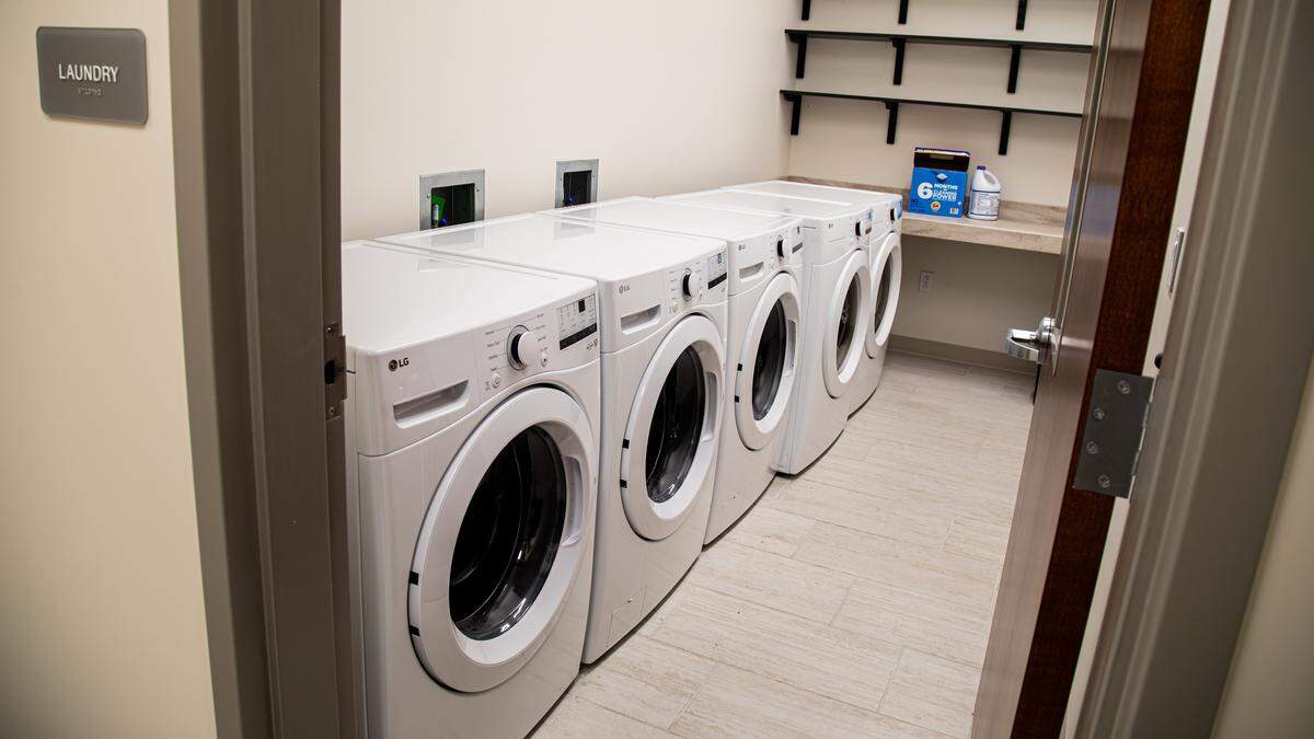 Shared laundry facility accommodating housed residents in the Hope Center's Emergency Shelter, on September 3, 2025, in Lexington, Ky.