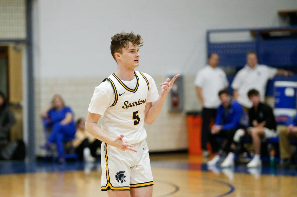 Sayre’s Noah Gallagher (5) celebrates scoring a 3-pointer against Lexington Christian during the All “A” Classic 11th Region semifinals at Frankfort High School’s F.D. Wilkinson Gymnasium on Thursday. Gallagher made four three-pointers in the second half to spark a Sayre comeback.