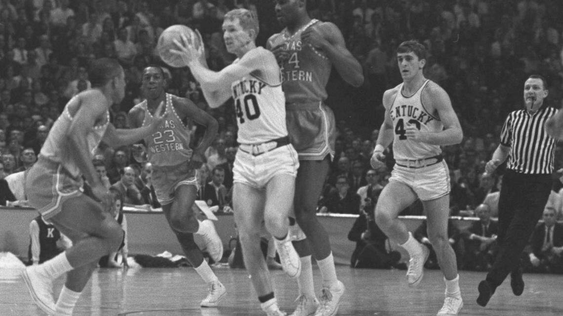 March 19, 1966. Kentucky's Larry Conley (40) is hemmed in by three Texas  Western players as he tried to move the ball in the first half of the NCAA  championship game last night. From left are Willie Worsley, Orsten Artis (23)  and Harry Flourney (44). Pat Riley of Kentucky moves into the play at the  right. Texas Western vs. Kentucky 72-65 (Texas Western won the game)  x.637 E  Envelope 2 Lexington Herald-Leader Photo Archive, Lexington, Ky. Photo  published in the Sunday Lexington Herald-Leader on March 20, 1966. This photo  was published as an Associated Press Photo, but the photo belongs to our  Photo Archive.