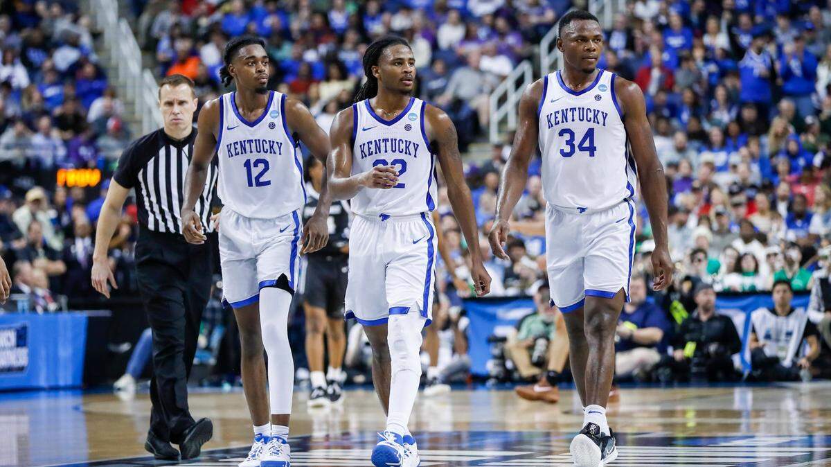 Kentucky players Antonio Reeves, left, Cason Wallace, center, and Oscar Tshiebwe will face Kansas State on Sunday.