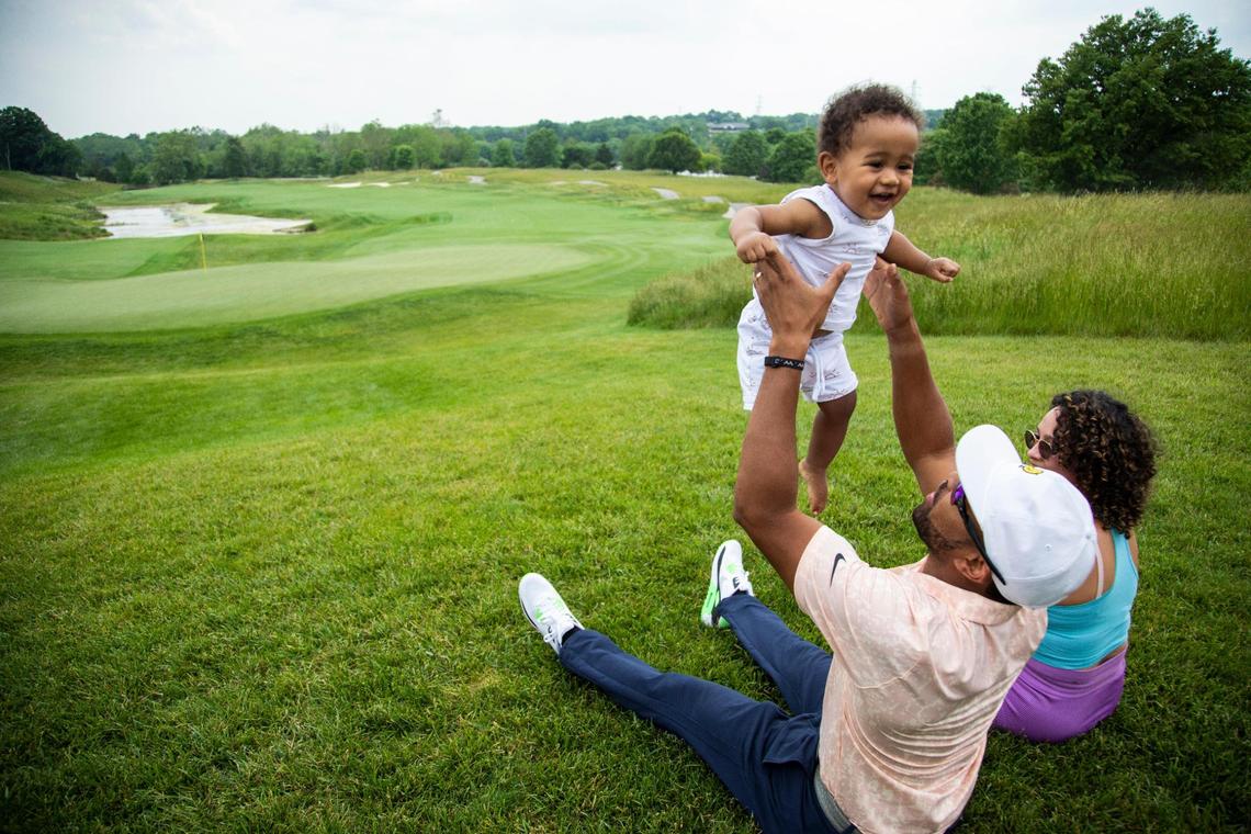 Doug Smith and Maribel Quezada Smith played with their son, Rency, after Doug finished the No. 18 hole at Valhalla Golf Club on Tuesday.