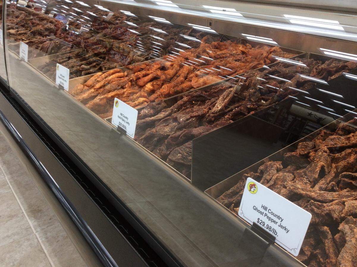 Buc-ee’s has a caseful of freshly made jerky as well as a wall of packaged jerky.