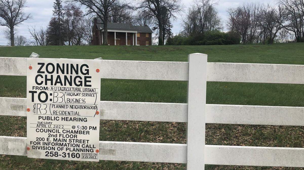 The Lexington-Fayette Urban County Council voted 12-0 to approve a zone change for approximately 11 acres on Harrodsburg Road for a mixed-use development that includes homes, townhouses and commercial space.