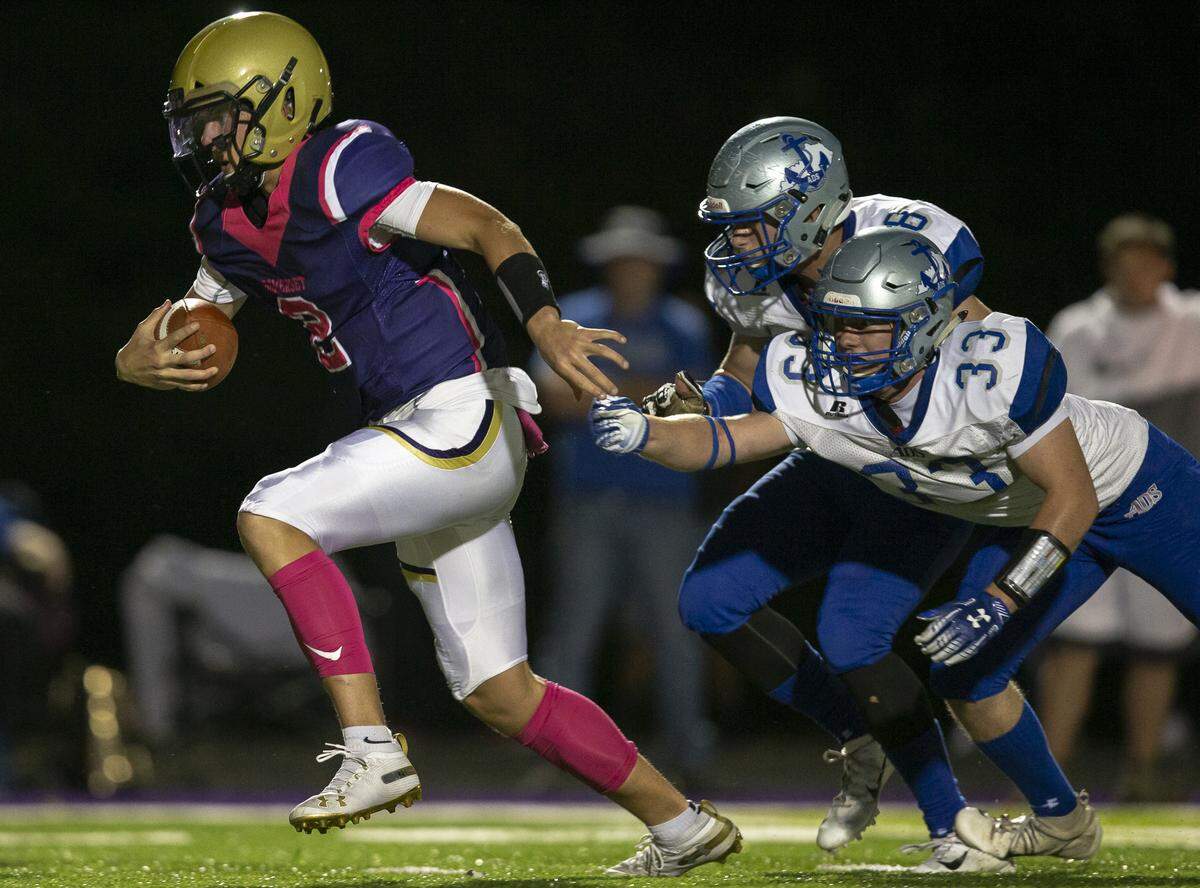 Somerset quarterback Kaiya Sheron runs the ball during a game against Danville.