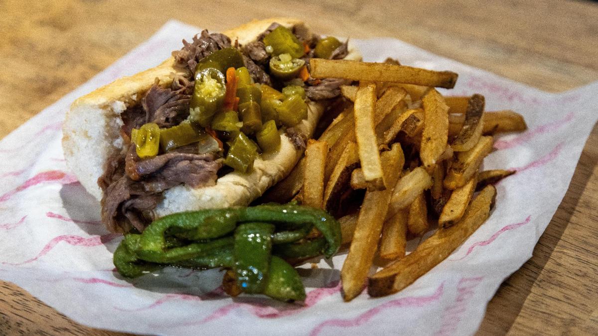 Chicago Italian beef sandwich with French fries from the South of Wrigley restaurant, which is opening on Southland Drive.