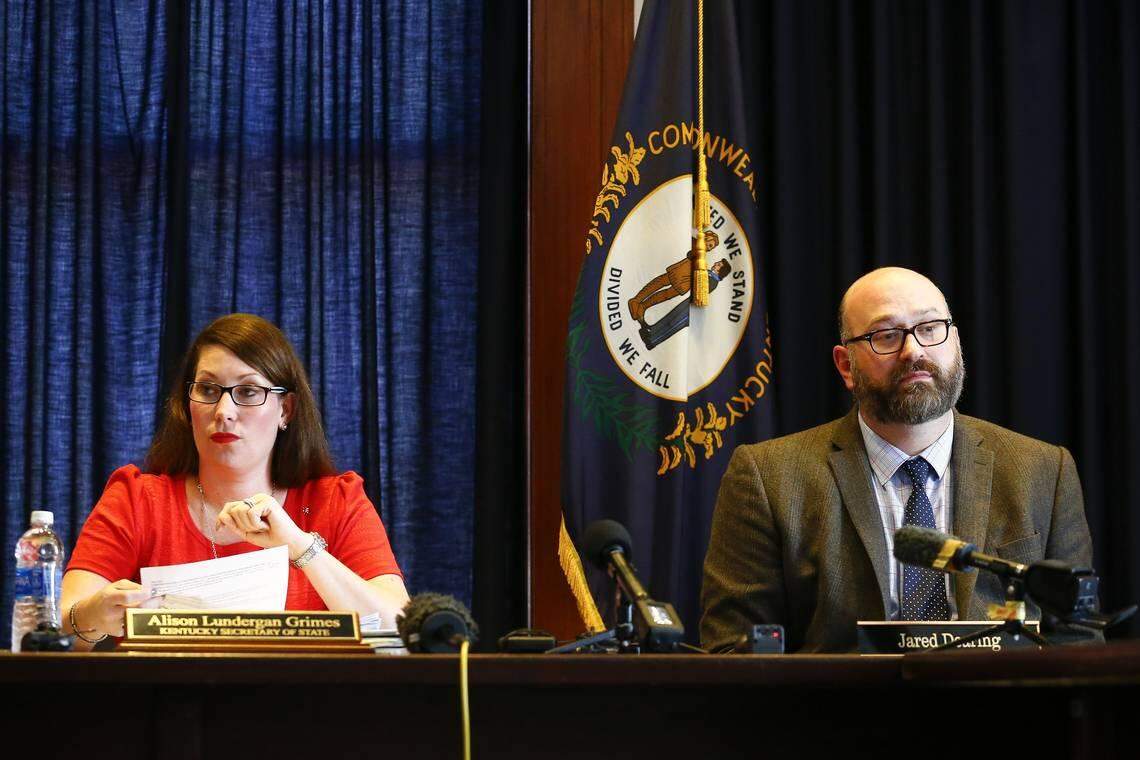 Kentucky Secretary of State Alison Lundergan Grimes and executive director of the State Board of Elections Jared Dearing during a special meeting of the State Board of Elections Aug. 28 at the Kentucky State Capitol in Frankfort. Dearing has accused Grimes of abuses of power.