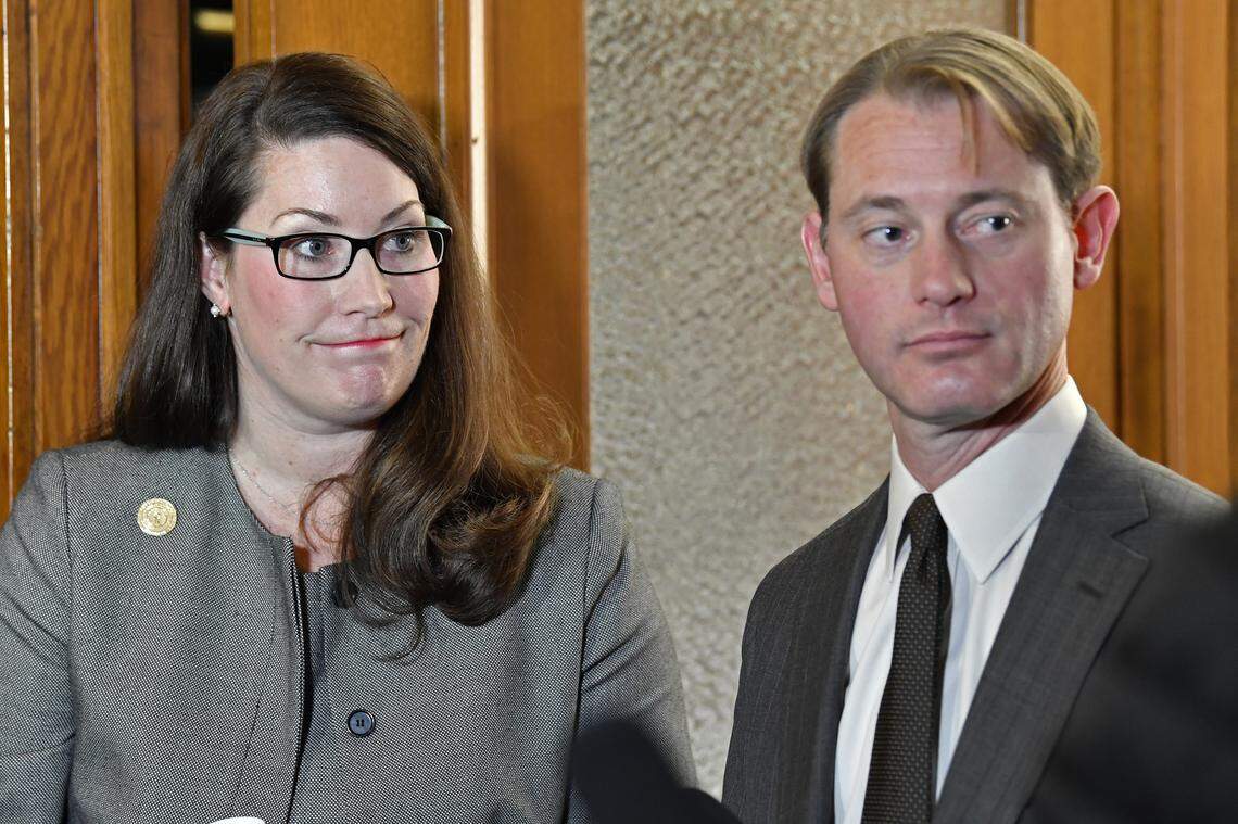 Kentucky Secretary of State Alison Lundergan Grimes, left, and Secretary of State elect Michael Adams speak with reporters following an update on the remcanvass results of the Kentucky gubernatorial election results in Frankfort, Ky., Thursday, Nov. 14, 2019.