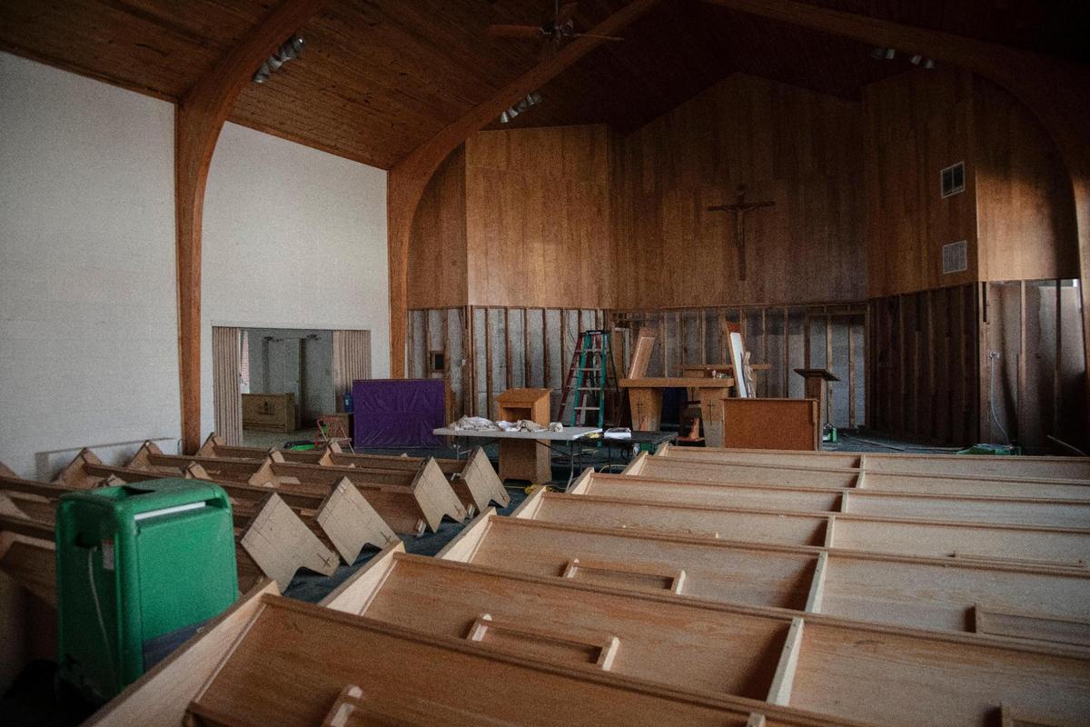 Fans and dehumidifiers run inside the Queen of all Saints Church to try and remove moisture left after the March flooding in Beattyville, Ky., Thursday, March 25, 2021. About $25,000 in donations of flood relief supplies were gathered through social media by Papal Missionary of Mercy, Father Jim Sichko and sent to the Queen of all Saints Church.