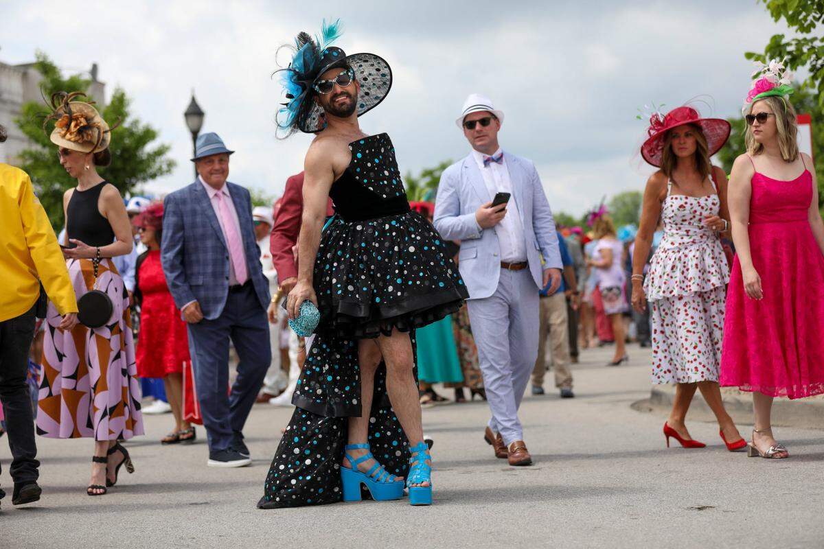 Saul Sugarman wears a dress he created to Kentucky Derby 150.