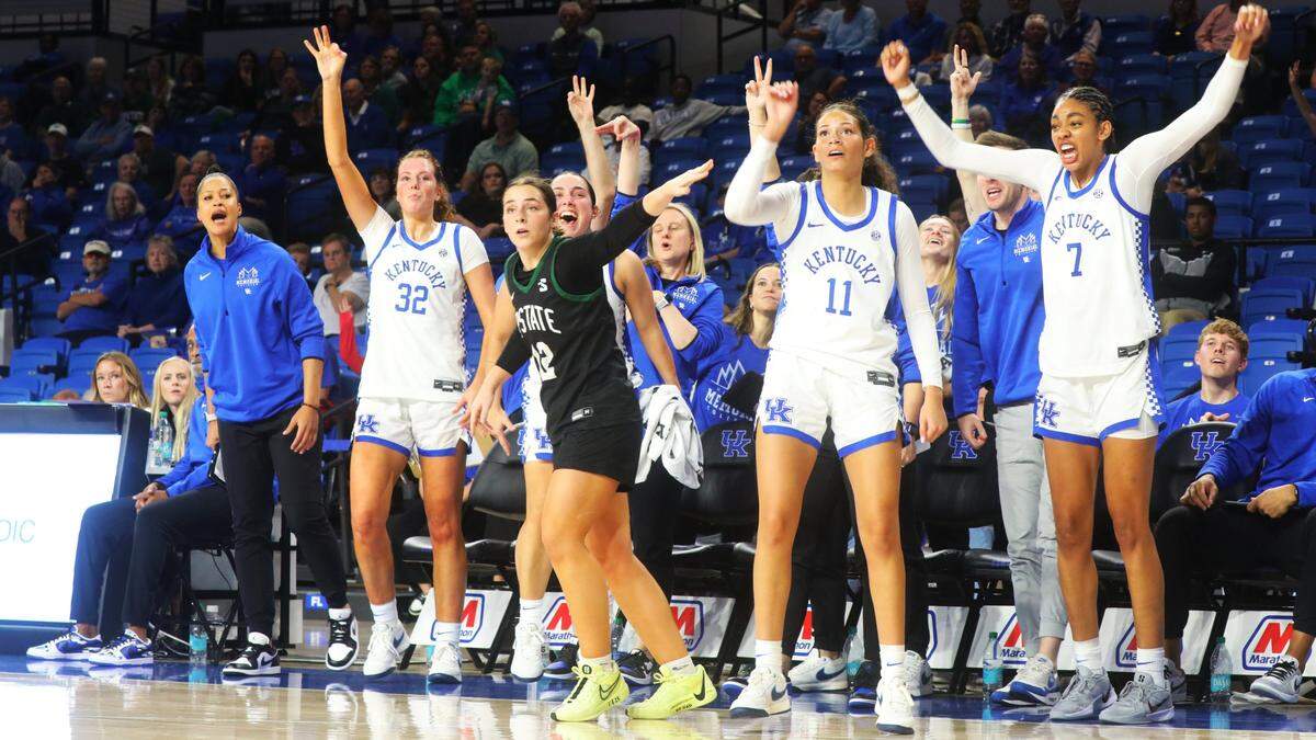 The UK bench was on its feet late in Kentucky’s season-opening win, celebrating the group on the floor in the closing minutes.
