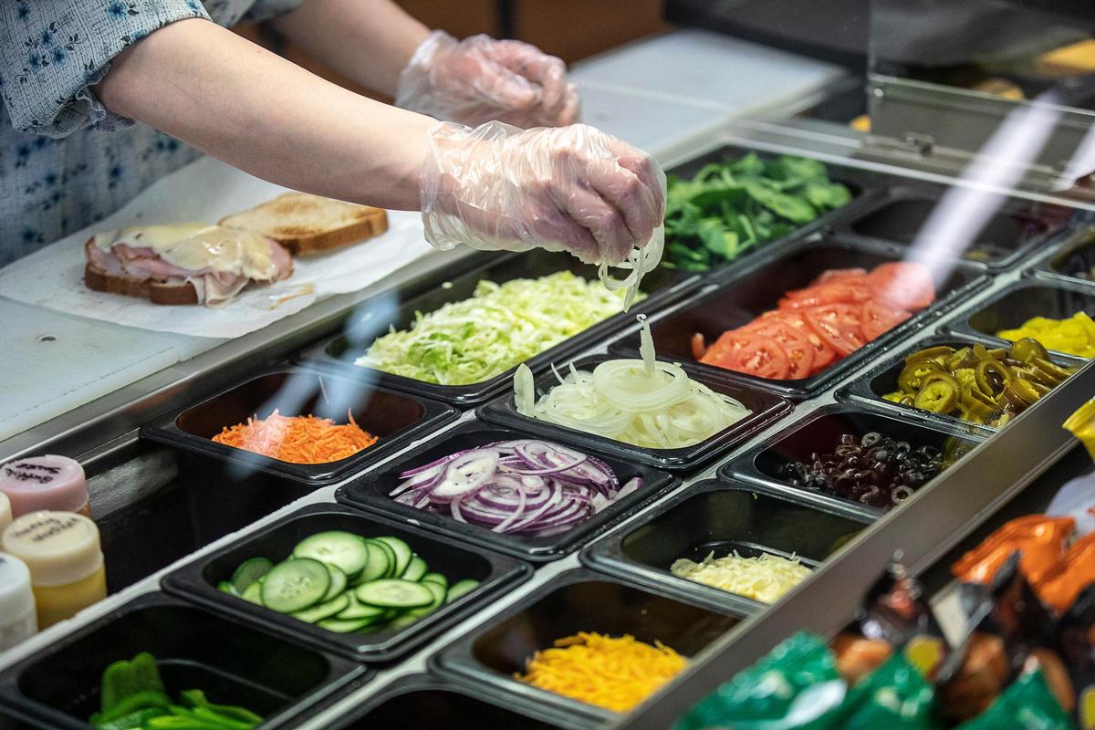 Charlotte Good makes a sandwich at Walnut Leaf Country Market at 4004 Camargo Rd. in Camargo, Ky., on Tuesday, Feb. 18, 2020.